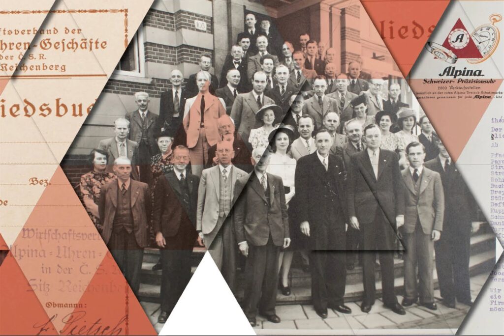 Photo d'archives de membres de l'Union Horlogère Alpina posant devant un bâtiment
